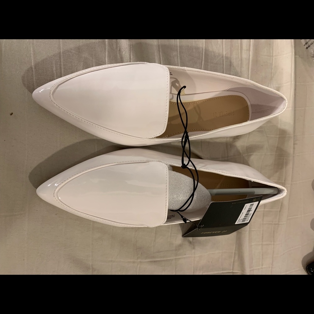 White flat shoes